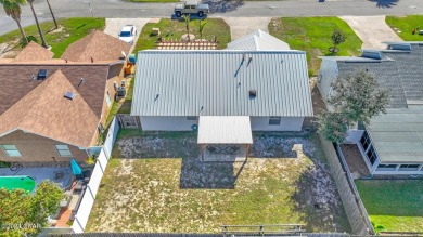 Discover your coastal retreat at Seaclusion Beach, located on Holiday Golf Club in Florida - for sale on GolfHomes.com, golf home, golf lot
