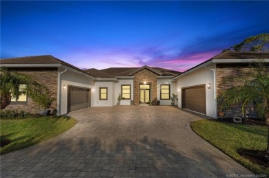 Nestled in the serene confines of the highly-sought Cobblestone on The Cape Club of Palm City in Florida - for sale on GolfHomes.com, golf home, golf lot