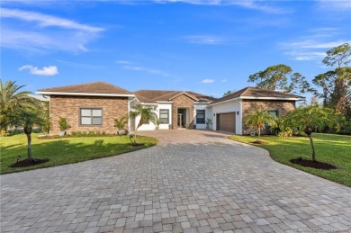 Nestled in the serene confines of the highly-sought Cobblestone on The Cape Club of Palm City in Florida - for sale on GolfHomes.com, golf home, golf lot