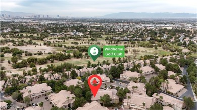 Discover resort-style living in this highly sought-after on WildHorse Golf Club in Nevada - for sale on GolfHomes.com, golf home, golf lot