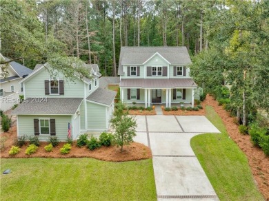 Completed in 2022, this beautiful 5 BR plus office home is on Berkeley Hall Golf Club in South Carolina - for sale on GolfHomes.com, golf home, golf lot