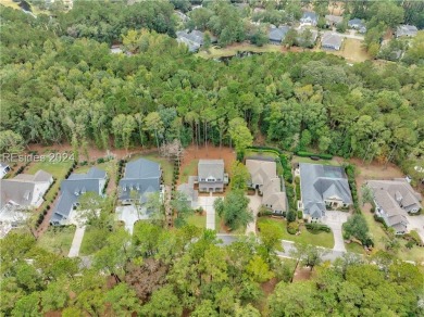 Completed in 2022, this beautiful 5 BR plus office home is on Berkeley Hall Golf Club in South Carolina - for sale on GolfHomes.com, golf home, golf lot