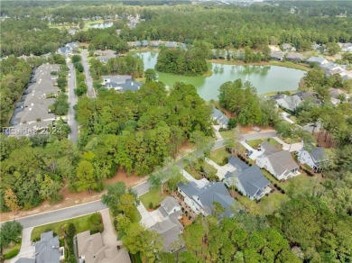 Completed in 2022, this beautiful 5 BR plus office home is on Berkeley Hall Golf Club in South Carolina - for sale on GolfHomes.com, golf home, golf lot