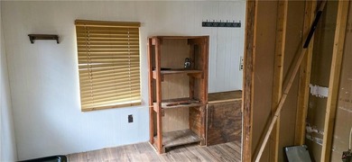 Calling all investors and weekend retreat seekers! If you love on Linn Valley Lakes - Deer Trace Golf Course in Kansas - for sale on GolfHomes.com, golf home, golf lot