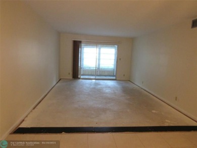 REDUCED! PRICED TO INVEST & FLIP OR TAKE ADVANTAGE OF A BLANK on Wynmoor Golf Course in Florida - for sale on GolfHomes.com, golf home, golf lot