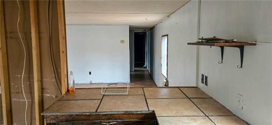 Calling all investors and weekend retreat seekers! If you love on Linn Valley Lakes - Deer Trace Golf Course in Kansas - for sale on GolfHomes.com, golf home, golf lot