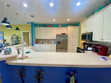 THIS POOL HOME IS A RARE FIND WITH VIEWS AND PRIVACY ON THE GOLF on Lake Ashton Golf Club in Florida - for sale on GolfHomes.com, golf home, golf lot