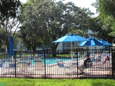 REDUCED! PRICED TO INVEST & FLIP OR TAKE ADVANTAGE OF A BLANK on Wynmoor Golf Course in Florida - for sale on GolfHomes.com, golf home, golf lot