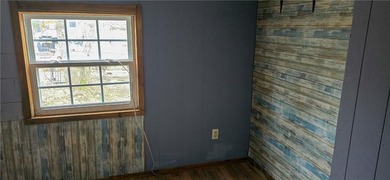 Calling all investors and weekend retreat seekers! If you love on Linn Valley Lakes - Deer Trace Golf Course in Kansas - for sale on GolfHomes.com, golf home, golf lot