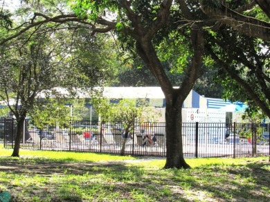 REDUCED! PRICED TO INVEST & FLIP OR TAKE ADVANTAGE OF A BLANK on Wynmoor Golf Course in Florida - for sale on GolfHomes.com, golf home, golf lot