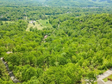 Build your dream home on this desirable 1.28-acre lot offering on Black Mountain Golf Course in North Carolina - for sale on GolfHomes.com, golf home, golf lot