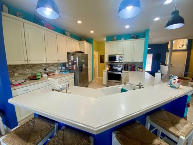 THIS POOL HOME IS A RARE FIND WITH VIEWS AND PRIVACY ON THE GOLF on Lake Ashton Golf Club in Florida - for sale on GolfHomes.com, golf home, golf lot
