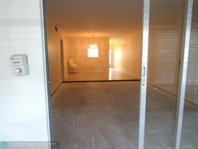 REDUCED! PRICED TO INVEST & FLIP OR TAKE ADVANTAGE OF A BLANK on Wynmoor Golf Course in Florida - for sale on GolfHomes.com, golf home, golf lot
