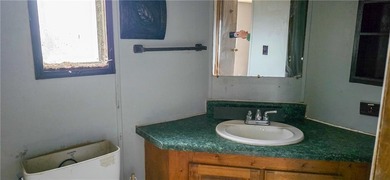 Calling all investors and weekend retreat seekers! If you love on Linn Valley Lakes - Deer Trace Golf Course in Kansas - for sale on GolfHomes.com, golf home, golf lot