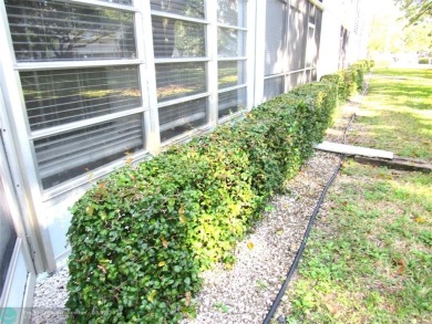REDUCED! PRICED TO INVEST & FLIP OR TAKE ADVANTAGE OF A BLANK on Wynmoor Golf Course in Florida - for sale on GolfHomes.com, golf home, golf lot