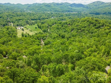 Build your dream home on this desirable 1.28-acre lot offering on Black Mountain Golf Course in North Carolina - for sale on GolfHomes.com, golf home, golf lot