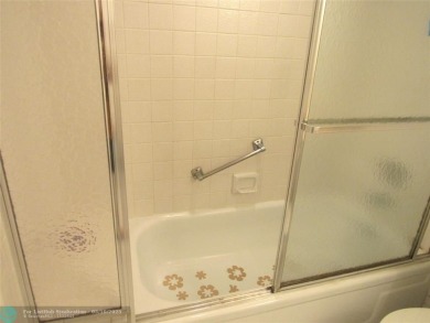 REDUCED! PRICED TO INVEST & FLIP OR TAKE ADVANTAGE OF A BLANK on Wynmoor Golf Course in Florida - for sale on GolfHomes.com, golf home, golf lot