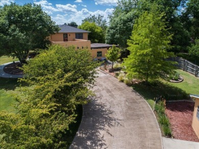 Welcome to this stunning Spanish-style stucco home, perfectly on Lake Tanglewood Golf Course in Texas - for sale on GolfHomes.com, golf home, golf lot