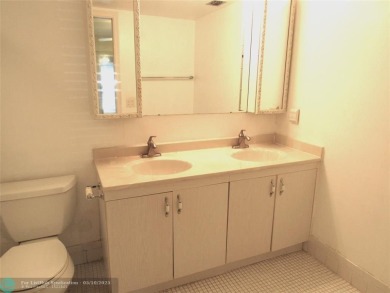 REDUCED! PRICED TO INVEST & FLIP OR TAKE ADVANTAGE OF A BLANK on Wynmoor Golf Course in Florida - for sale on GolfHomes.com, golf home, golf lot