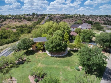 Welcome to this stunning Spanish-style stucco home, perfectly on Lake Tanglewood Golf Course in Texas - for sale on GolfHomes.com, golf home, golf lot