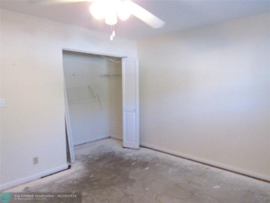 REDUCED! PRICED TO INVEST & FLIP OR TAKE ADVANTAGE OF A BLANK on Wynmoor Golf Course in Florida - for sale on GolfHomes.com, golf home, golf lot