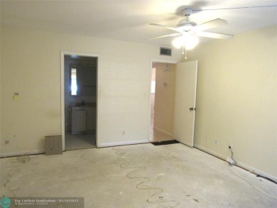 REDUCED! PRICED TO INVEST & FLIP OR TAKE ADVANTAGE OF A BLANK on Wynmoor Golf Course in Florida - for sale on GolfHomes.com, golf home, golf lot