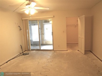 REDUCED! PRICED TO INVEST & FLIP OR TAKE ADVANTAGE OF A BLANK on Wynmoor Golf Course in Florida - for sale on GolfHomes.com, golf home, golf lot