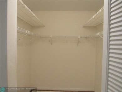 REDUCED! PRICED TO INVEST & FLIP OR TAKE ADVANTAGE OF A BLANK on Wynmoor Golf Course in Florida - for sale on GolfHomes.com, golf home, golf lot