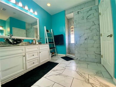 THIS POOL HOME IS A RARE FIND WITH VIEWS AND PRIVACY ON THE GOLF on Lake Ashton Golf Club in Florida - for sale on GolfHomes.com, golf home, golf lot