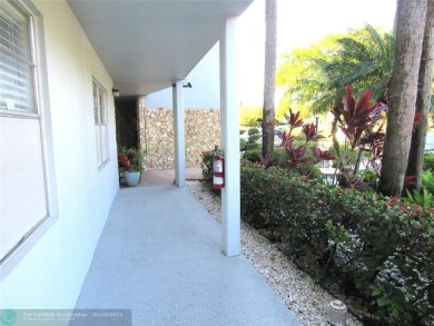 REDUCED! PRICED TO INVEST & FLIP OR TAKE ADVANTAGE OF A BLANK on Wynmoor Golf Course in Florida - for sale on GolfHomes.com, golf home, golf lot