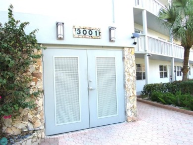 REDUCED! PRICED TO INVEST & FLIP OR TAKE ADVANTAGE OF A BLANK on Wynmoor Golf Course in Florida - for sale on GolfHomes.com, golf home, golf lot