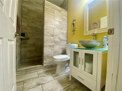 THIS POOL HOME IS A RARE FIND WITH VIEWS AND PRIVACY ON THE GOLF on Lake Ashton Golf Club in Florida - for sale on GolfHomes.com, golf home, golf lot