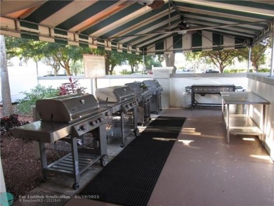REDUCED! PRICED TO INVEST & FLIP OR TAKE ADVANTAGE OF A BLANK on Wynmoor Golf Course in Florida - for sale on GolfHomes.com, golf home, golf lot