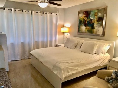 Beautiful fully remodeled pet friendly Cypress Grove Country on Palm-Aire Country Club and Resort - The Oaks in Florida - for sale on GolfHomes.com, golf home, golf lot