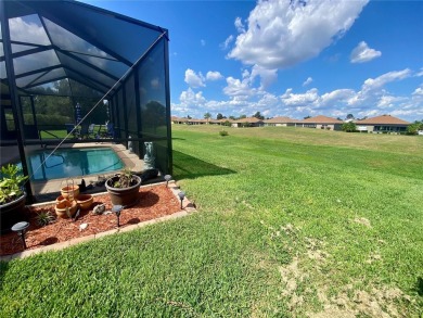 THIS POOL HOME IS A RARE FIND WITH VIEWS AND PRIVACY ON THE GOLF on Lake Ashton Golf Club in Florida - for sale on GolfHomes.com, golf home, golf lot