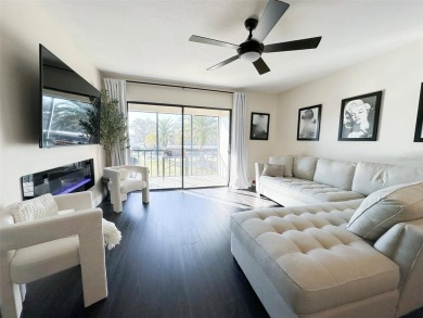 Absolutely Stunning! This 2 Bedroom 2 Bathroom Condo is located on East Lake Woodlands Country Club in Florida - for sale on GolfHomes.com, golf home, golf lot