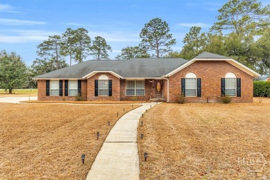Classic all-brick home perfectly positioned on Hole 1 of the on Cherokee Rose Country Club in Georgia - for sale on GolfHomes.com, golf home, golf lot