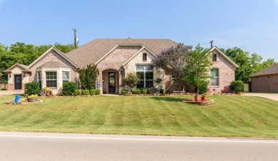 CHARMING BRICK & ROCK HOME in Pecan Plantation gated golfing for sale on GolfHomes.com