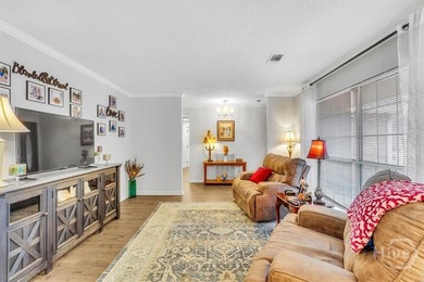 Classic all-brick home perfectly positioned on Hole 1 of the on Cherokee Rose Country Club in Georgia - for sale on GolfHomes.com, golf home, golf lot