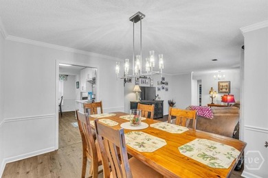 Classic all-brick home perfectly positioned on Hole 1 of the on Cherokee Rose Country Club in Georgia - for sale on GolfHomes.com, golf home, golf lot