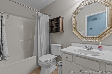 Welcome to 4511 BlueBush Drive-A Comfortable Ranch Retreat in on Baywood Golf Club in North Carolina - for sale on GolfHomes.com, golf home, golf lot