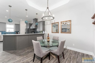 Beautiful lakefront home in the SPI Golf Community! This on South Padre Island Golf Club in Texas - for sale on GolfHomes.com, golf home, golf lot