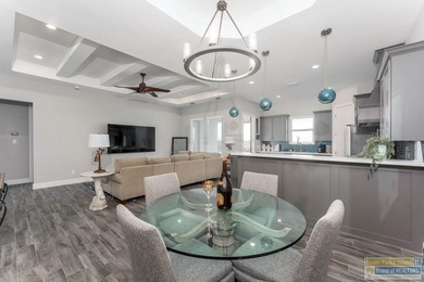 Beautiful lakefront home in the SPI Golf Community! This on South Padre Island Golf Club in Texas - for sale on GolfHomes.com, golf home, golf lot