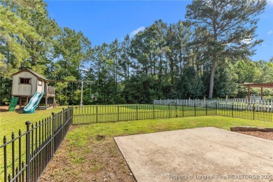 Welcome to 4511 BlueBush Drive-A Comfortable Ranch Retreat in on Baywood Golf Club in North Carolina - for sale on GolfHomes.com, golf home, golf lot