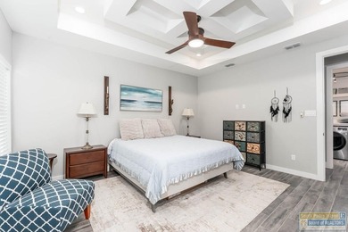 Beautiful lakefront home in the SPI Golf Community! This on South Padre Island Golf Club in Texas - for sale on GolfHomes.com, golf home, golf lot