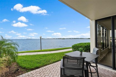 Live the small beach town lifestyle in this beautiful waterfront on The Dunedin Country Club in Florida - for sale on GolfHomes.com, golf home, golf lot