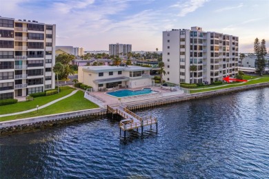 Live the small beach town lifestyle in this beautiful waterfront on The Dunedin Country Club in Florida - for sale on GolfHomes.com, golf home, golf lot