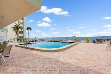 Live the small beach town lifestyle in this beautiful waterfront on The Dunedin Country Club in Florida - for sale on GolfHomes.com, golf home, golf lot