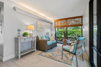 Live the small beach town lifestyle in this beautiful waterfront on The Dunedin Country Club in Florida - for sale on GolfHomes.com, golf home, golf lot