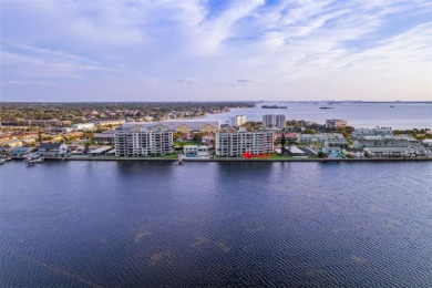 Live the small beach town lifestyle in this beautiful waterfront on The Dunedin Country Club in Florida - for sale on GolfHomes.com, golf home, golf lot